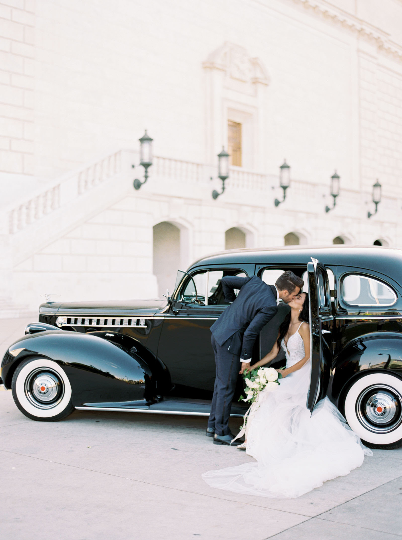 Wedding photos at the Detroit institute of arts with classic car